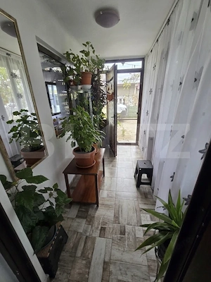 Casă din cărămidă, renovată integral, cu gospodărie în com. Cornățelu