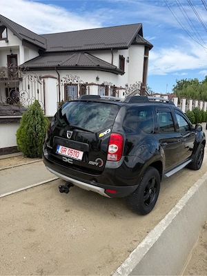 Dacia Duster 1.6 4x4 - imagine 4