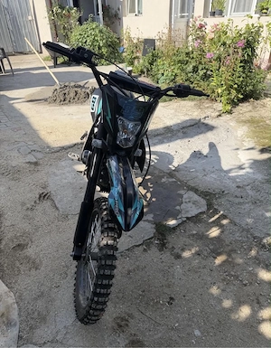 Vand kxd 125cc,4 timpi,foarte putin folosit - imagine 2