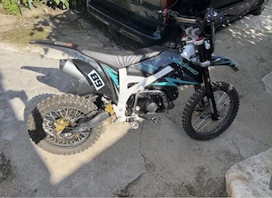 Vand kxd 125cc,4 timpi,foarte putin folosit