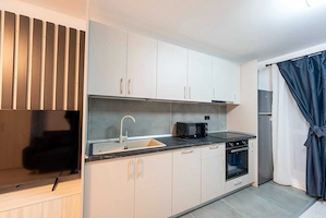 Inchiriez apartament de 2 camere la metrou Piata Sudului, complet utilat si mobilat - imagine 2