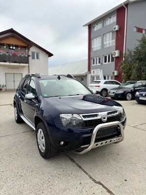 Dacia Duster 1.6i 4x4 Euro 5 - imagine 2