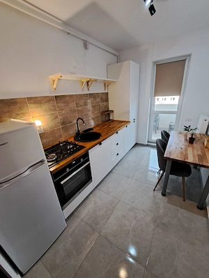 Apartament de inchiriat cu 2 camere Popesti Leordeni parcare subterana si boxa - imagine 4