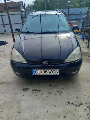 Vînd autoturizm Ford Focus motor 1.6 benzină an fabricație 2004  preț 4000 lei ușor negociabil - imagine 2