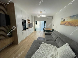 Apartament nou 2 camere balcon loc parcare zona Brana Selimbar - imagine 3
