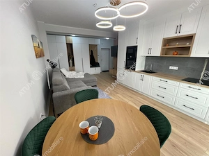 Apartament nou 2 camere balcon loc parcare zona Brana Selimbar - imagine 4