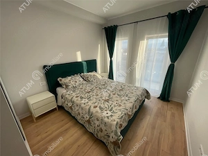 Apartament nou 2 camere balcon loc parcare zona Brana Selimbar - imagine 5