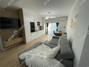 Apartament nou 2 camere balcon loc parcare zona Brana Selimbar - imagine 2