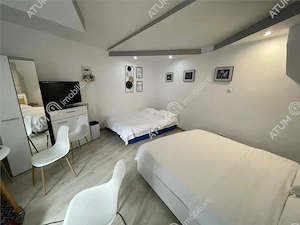 Garsoniera la casa curte comuna in zona ultracentrala Sibiu
