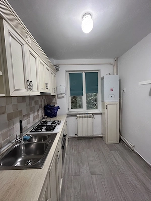 Apartament 2 camere,etaj 2,semidecomandat,centrală,AC,zona Tătărasi Flora - imagine 3