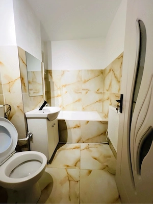 Apartament 57 mp Decomandat,Confort 1 situat in Tecuci pe Str. 7 Noiembrie - imagine 10