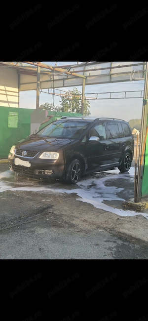 Mașină de vânzare an 2004