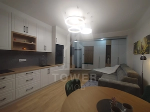 Apartament modern de închiriat, cu balcon și loc de parcare