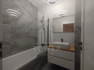 Apartament modern de închiriat, cu balcon și loc de parcare - imagine 9