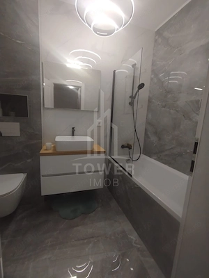 Apartament modern de închiriat, cu balcon și loc de parcare - imagine 10