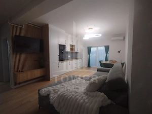 Apartament modern de închiriat, cu balcon și loc de parcare - imagine 8