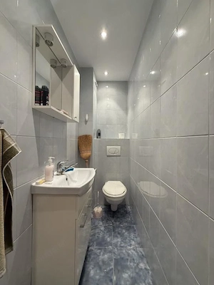 Apartament cu 3 camere, cu boxa si garaj, etaj 2 - Dambovita - imagine 8