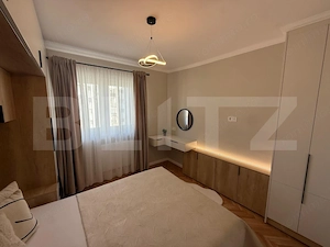 Apartament ultrafinisat, 2 camere decomandate , panorama , zona Primaverii  - imagine 11