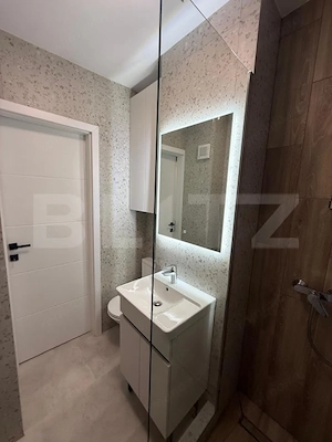 Apartament ultrafinisat, 2 camere decomandate , panorama , zona Primaverii  - imagine 16
