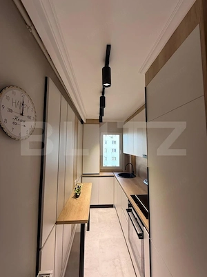 Apartament ultrafinisat, 2 camere decomandate , panorama , zona Primaverii  - imagine 14