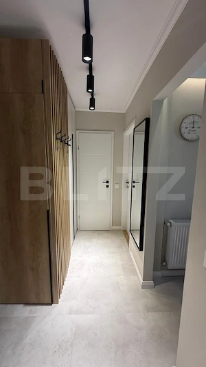 Apartament ultrafinisat, 2 camere decomandate , panorama , zona Primaverii  - imagine 12