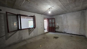 Casa individuala cu 4 camere, curte generoasa si anexa in Plopi - imagine 11