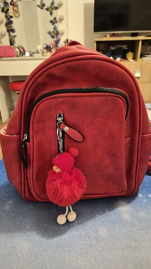 vand rucsac rosu