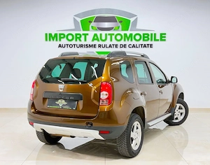 Dacia Duster 1.6 16V 4x4 - imagine 9