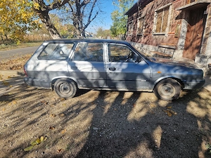 Vând Dacia  break