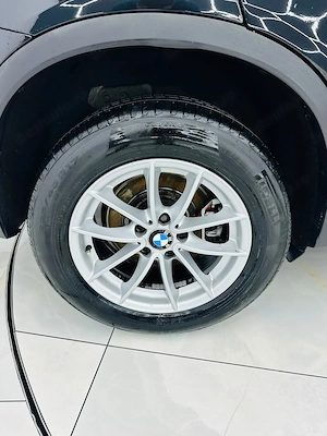 Bmw Seria X - imagine 9
