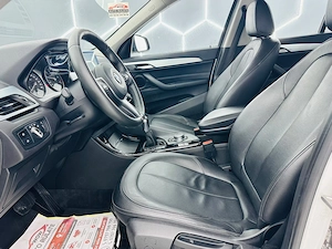 Bmw Seria X - imagine 11