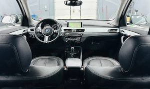 Bmw Seria X - imagine 6