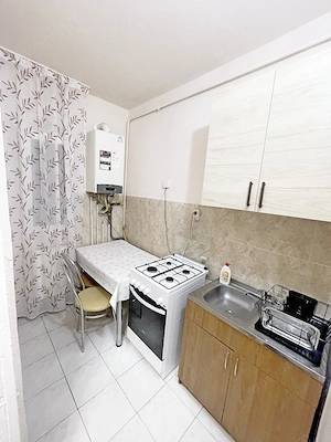 Zona Complexului Studențesc - de închiriat apartament cu o cameră cu centrală proprie la parte 250 E - imagine 14