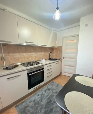  CHIRIE in zona Tractorul apartament 2 camere - imagine 6