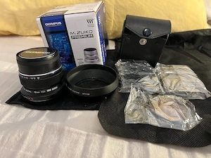 Olympus 12mm f2.0,set filtre și parasolar