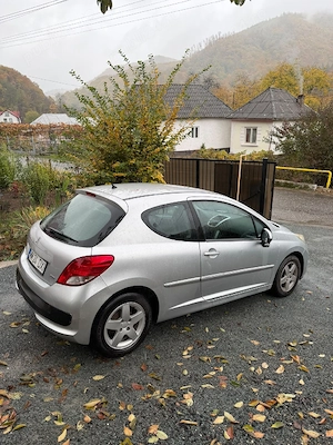 Peugeot 207 1.4hdi din 2012, jante aliaj, clima, 2 uși, pilot automat, geamuri electrice!   2 seturi - imagine 5