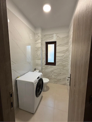 Proprietar   închiriez apartament nou, cu 3 camere și 2 băi - imagine 10