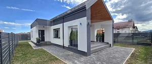 Casă individuală cu design nordic, terasă acoperită și pod funcțional – Izvor