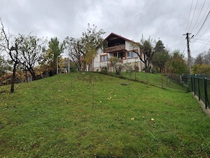 Casa 5 camere, bucatarie, baie, beci, util 112 mp, garaj, teren intravilan 1200 mp cu pomi fructifer - imagine 7