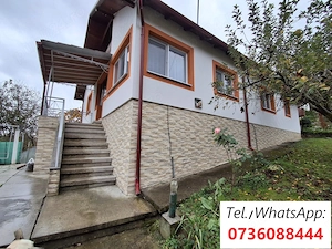 Casa 5 camere, bucatarie, baie, beci, util 112 mp, garaj, teren intravilan 1200 mp cu pomi fructifer