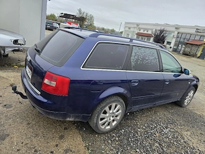 Audi A6 quattro 2.5 TDI 180cp - imagine 2