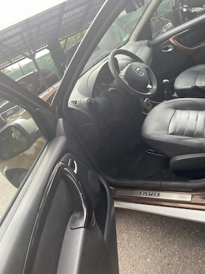Duster de vânzare an 2011 motor 1 .6gpl preț 5990 neg  - imagine 2